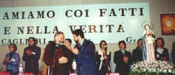 Padre Natale Merelli con Giuliano Monaco sul palco Padre Natale Merelli con Giuliano Monaco sul palco